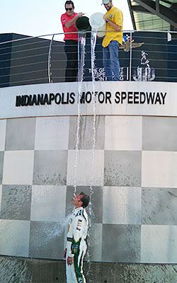 Ed Carpenter accepts the ice bucket challenge with the help of James Hinchcliffe