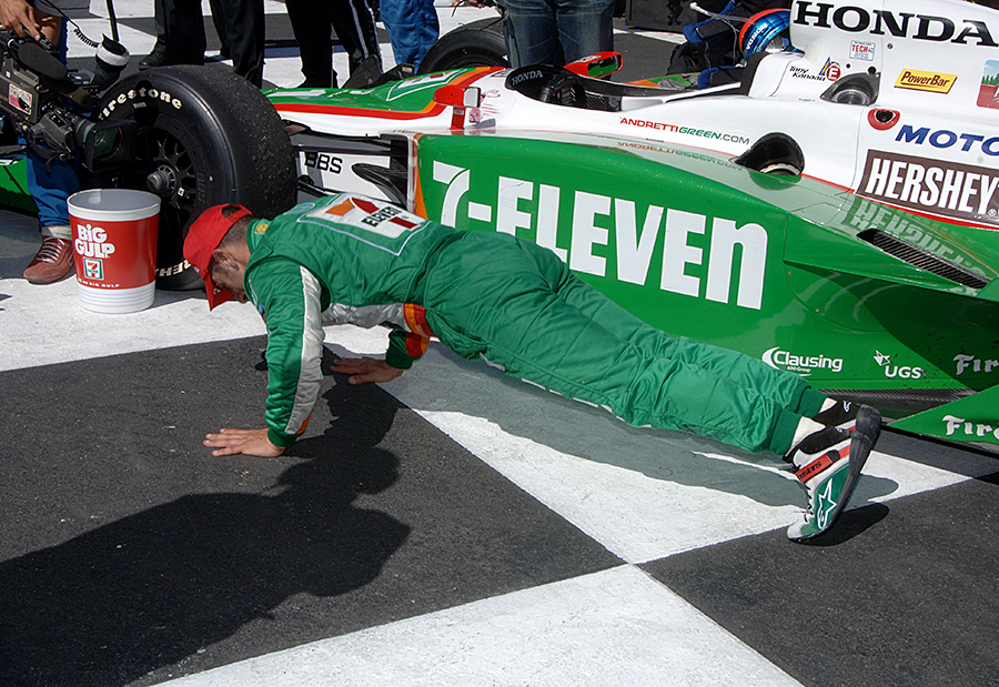 Tony Kanaan does push ups in Victory Lane at Sonoma in 2005
